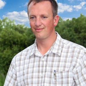 Man standing in front to crop.