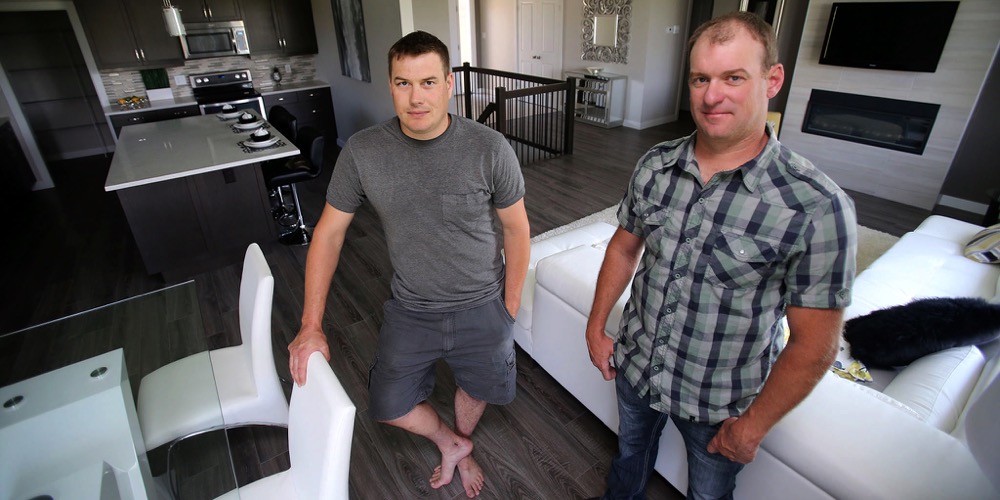 It was important that we did it without any farm money,” says Braun (r), with Boonstra in one of their two show homes. “It really legitimized it because we didn’t have keep pumping outside money in.”