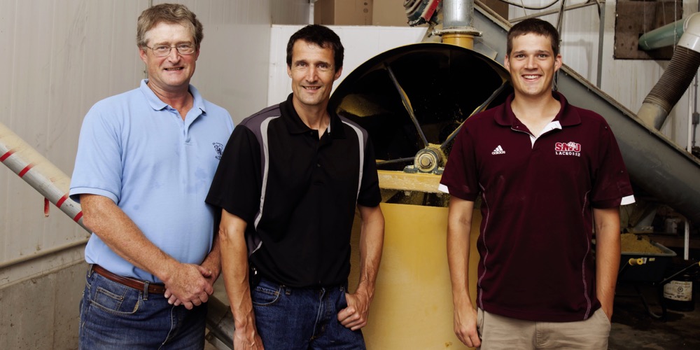 (l to r) Craig, Brian and one of the next generation of Newcombes, Craig’s son David