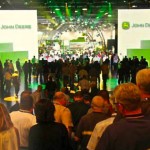 After the official presentation of new machines, dealers leave the stands to walk behind the stage and mingle with the new-equipment and -product specialists.
