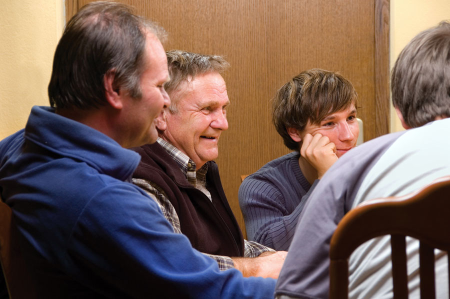 Farm family having a meeting.