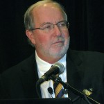 man speaking into microphone