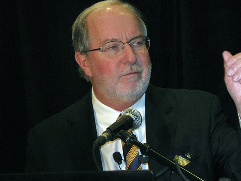 man speaking into microphone