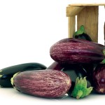 Eggplants and a wooden crate.