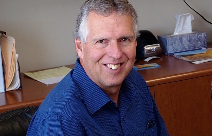 man sitting at desk