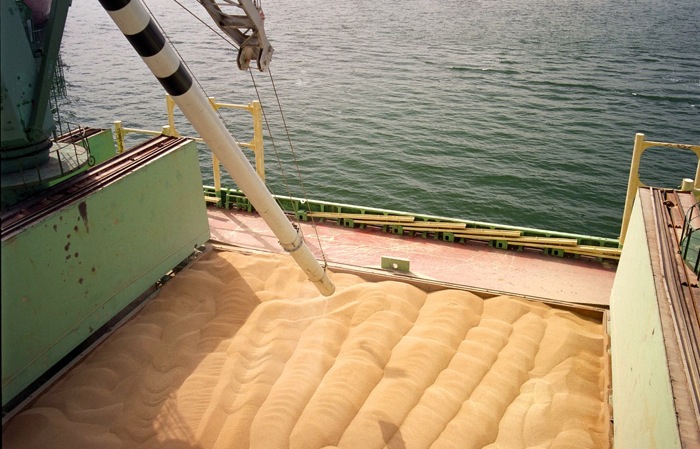 grain being loaded onto a ship