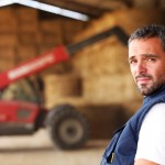 farmer in a haybarn