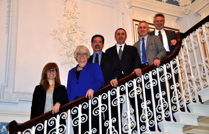 people standing on a staircase