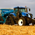 What if you could have a tractor that combines the overall versatility of a wheeled tractor and the traction and flotation benefits that come with rubber tracks? New Holland says it is making that possible with the Genesis T8 SmartTrax. One of the drawbacks of having a twin-track machine is the need to slow down in turns, increasing the chance of scuffing or even damaging the soil. With the Genesis T8 SmartTrax, that concern is attacked with wheels up front that offer tighter turning, more ride comfort and less damage. The purpose-developed axles are built with the strength needed for high power and torque to carry heavy loads. Plus there’s the advantage of the T8.410 which boasts 409 hp and the T8.435 with 435 hp maximum. And by offering a choice of undercarriage, the Genesis T8 SmartTrax tractors can provide a choice of working widths — from 76 to 152 inches.