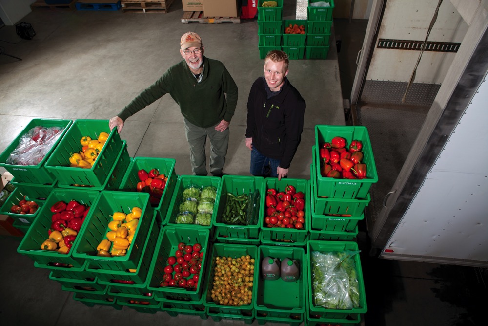two men in a vegetable warehouse