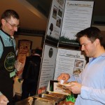 man trying a food sample at an event