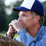 farmer thinking with hands crossed