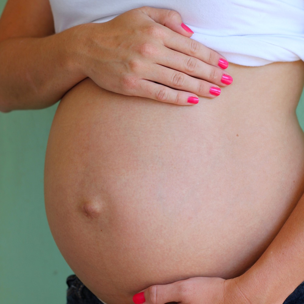woman's pregnant belly