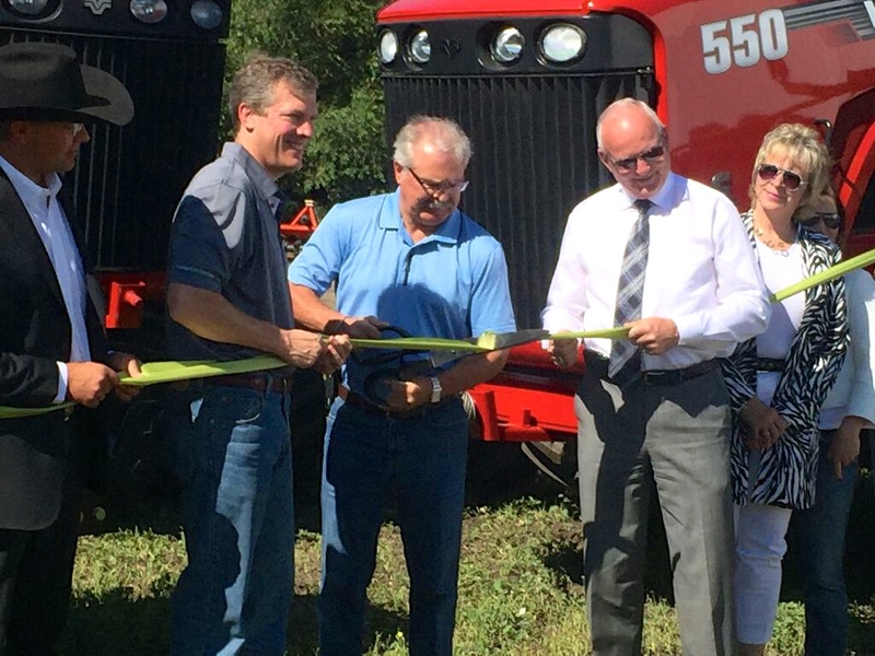 Ag in Motion was officially opened with a ribbon-cutting by (l-r) Glacier Media Group president and CEO Jon Kennedy, federal Agriculture Minister Gerry Ritz and Saskatchewan Agriculture Minister Lyle Stewart.