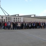 Delegates and mentors of the Youth Ag-Summit gather for a photo in front of Australia's parliament in Canberra, before heading out to a research station.