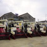 These combine harvesters are part of the fleet of farm equipment at Jianhu Lantian Agricultural Machinery Co-operative, established in 2007 near Yancheng in Jiangsu Province.