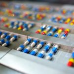 Close-up of the automatic capsule package production line.