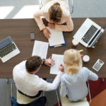 Top view of professional investment advisor woman consulting about financial plan with business management.