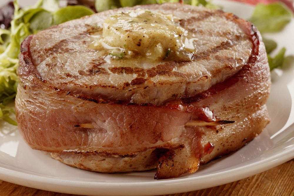 A bacon-wrapped pork chop. (PorkBeInspired.com)
