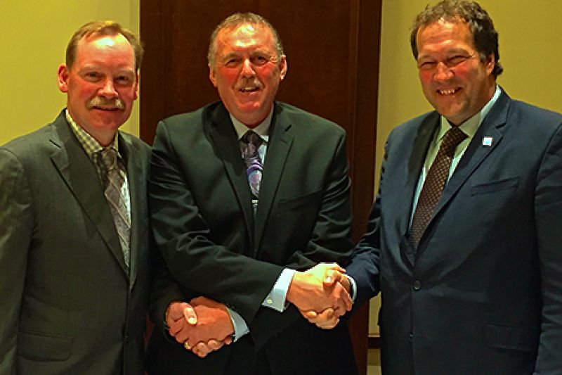 Norm McNaughton (l) and Pierre Lampron (r) with CanWest DHI chair Ed Friesen. (CanwestDHI.com)
