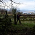 Farmer John Sheridan opens a gate on a farm which straddles both borders where the gate marks the exact border between Ireland and Northern Ireland between County Cavan and County Fermanagh near Florencecourt, Northern Ireland on Nov. 30. (Clodagh Kilcoyne photo for Reuters)