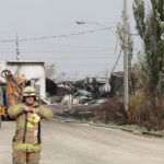Winnipeg firefighters cool down the wreckage of Speedway International as demolition contractors move in. (Dave Bedard photo)
