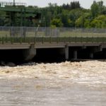Water churns through the Portage Diversion spillway in Manitoba on July 6. Approaching cooler air masses may bring a reduced chance of rainfall in the region. (Co-operator photo by Shannon VanRaes)
