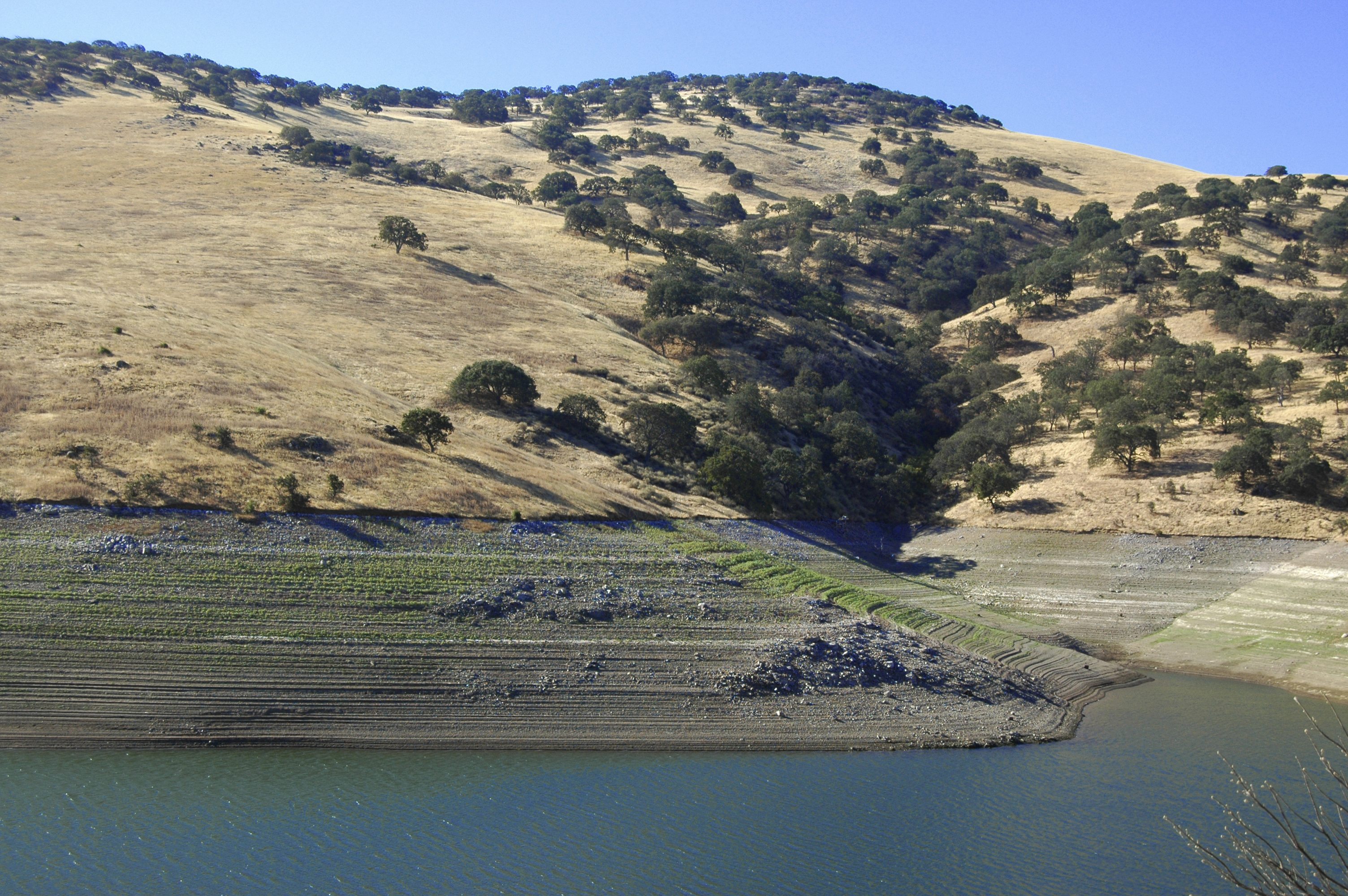 A depleted reservoir in California.  It’s estimate drought has cost the state $2.2 billion. Photo: Thinkstock
