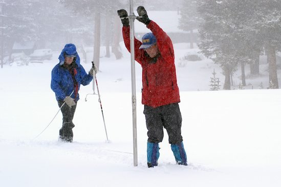California’s Department of Water Resources gauges the snowpack in the Sierra Nevada mountains through manual surveys, such as this one in late December 2004. (Paul Hames photo, copyright California Department of Water Resources)

