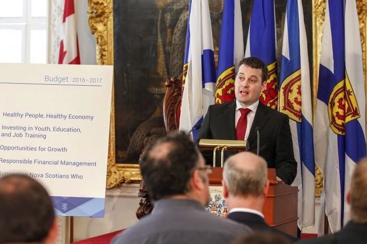 Nova Scotia Finance Minister Randy Delorey lays out the budget for reporters Tuesday in Halifax. (NovaScotia.ca)

