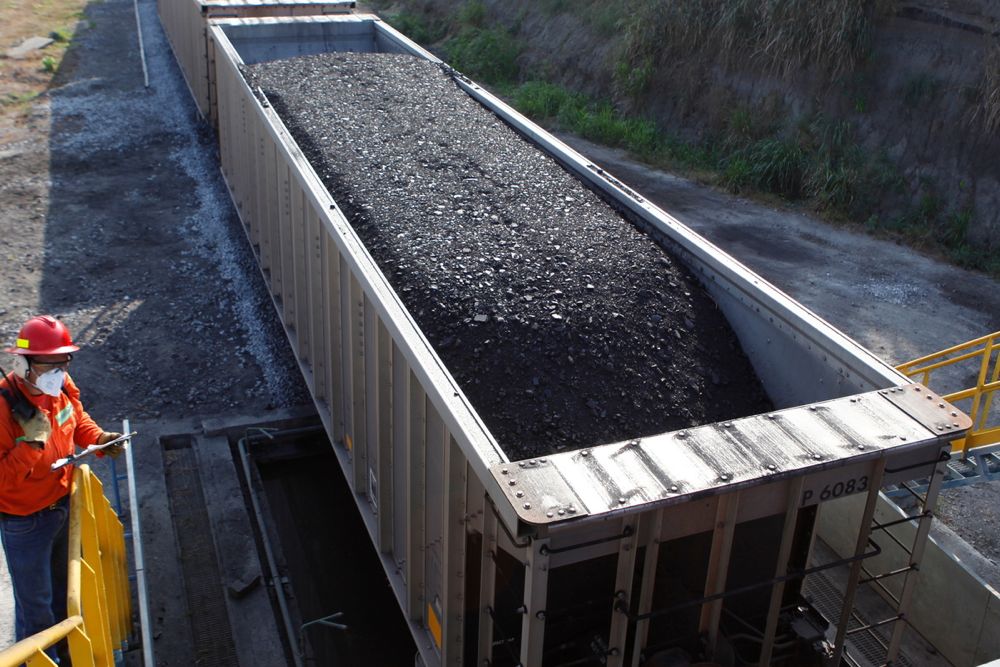Rail cars arrive at Glencore’s Puerto Prodeco coal depository in Colombia. (Glencore.com)