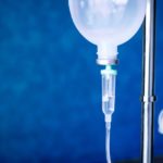 Close up saline IV drip for patient and Infusion pump in hospital