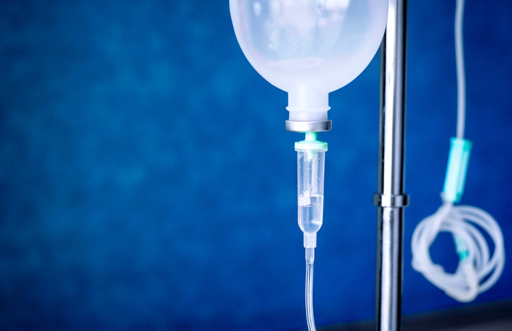 Close up saline IV drip for patient and Infusion pump in hospital