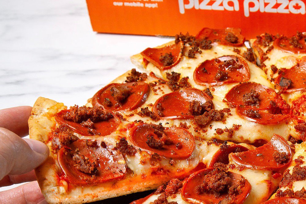 Canadian chain Pizza Pizza has added two plant-based options to its roster of pizza toppings. (CNW Group/Pizza Pizza Ltd.) 

