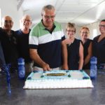 Doug Baron cuts the cake celebrating 20 years of giving by the Carberry and Area Community Foundation.
