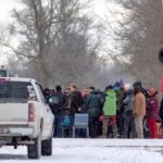 Federal Indigenous Services Minister Marc Miller meets with representatives of the Mohawk Nation at the site of a rail stoppage at Tyendinaga, Ont., east of Belleville, on Feb. 15, 2020. (Photo: Reuters/Carlos Osorio)