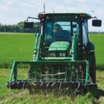 Farming Smarter general manager Ken Coles operates a hail simulator designed to test the effects of “rescue products” for recovering from hail damage.