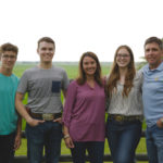 Tara Sawyer, centre, with husband Matt, right, and from left, Quin, Emmett and Cassidy.