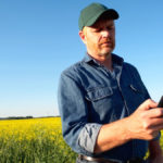 Many farmers still rely on dial-up service or muddle through limited broadband capacity to download information on their cell phone.