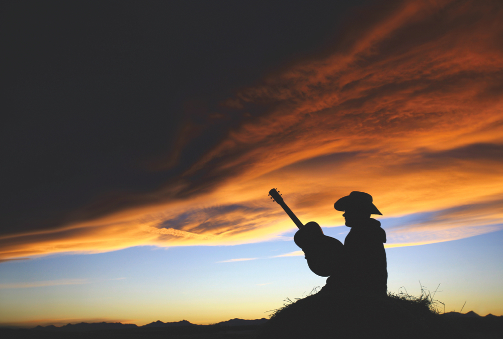 Humming, strumming along with song