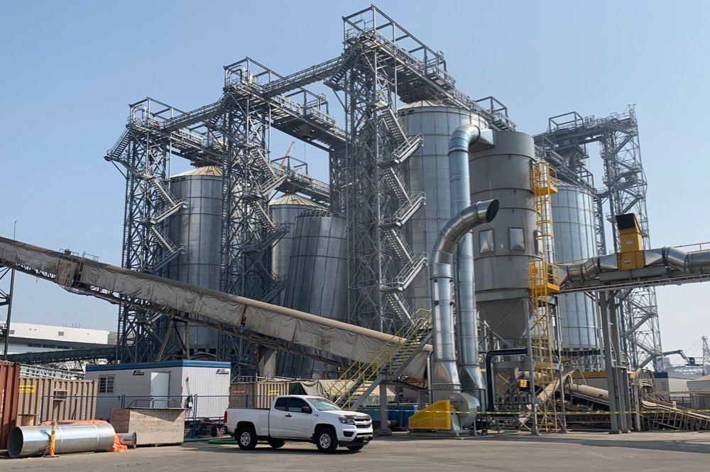 No injuries were reported in the collapse of a grain bin at Fibreco’s Vancouver port terminal on Sept. 11, 2020. (DNV Fire Rescue Service photo via Twitter)
