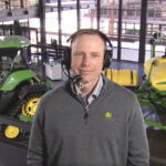 Jahmy Hindman, chief technology officer at John Deere, answers questions remotely from Deere’s world headquarters in Illinois during an online presentation at CES.