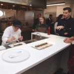James Battershill (right) speaks at the Prairie Research Kitchen in Winnipeg about the development of his blended beef and plant-based Bump product.