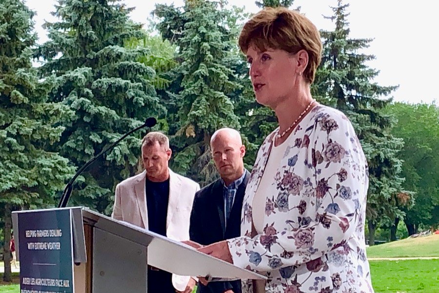 Federal Agriculture Minister Marie-Claude Bibeau, shown here with Craig Riese (l) of Keystone Agricultural Producers and Manitoba Beef Producers president Tyler Fulton, speaks on July 22, 2021 at The Forks in Winnipeg. (Dave Bedard photo)
