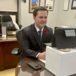 After denying he had a drinking problem, Devin Dreeshen drew more criticism for posting this picture on social media. Critics said perching his iPad on a drinks cooler wasn’t amusing and others pointed to what appears to be a wine bottle under the desk on the right-hand side of the photo. Dreeshen resigned as ag minister Nov. 5. Photo: Twitter