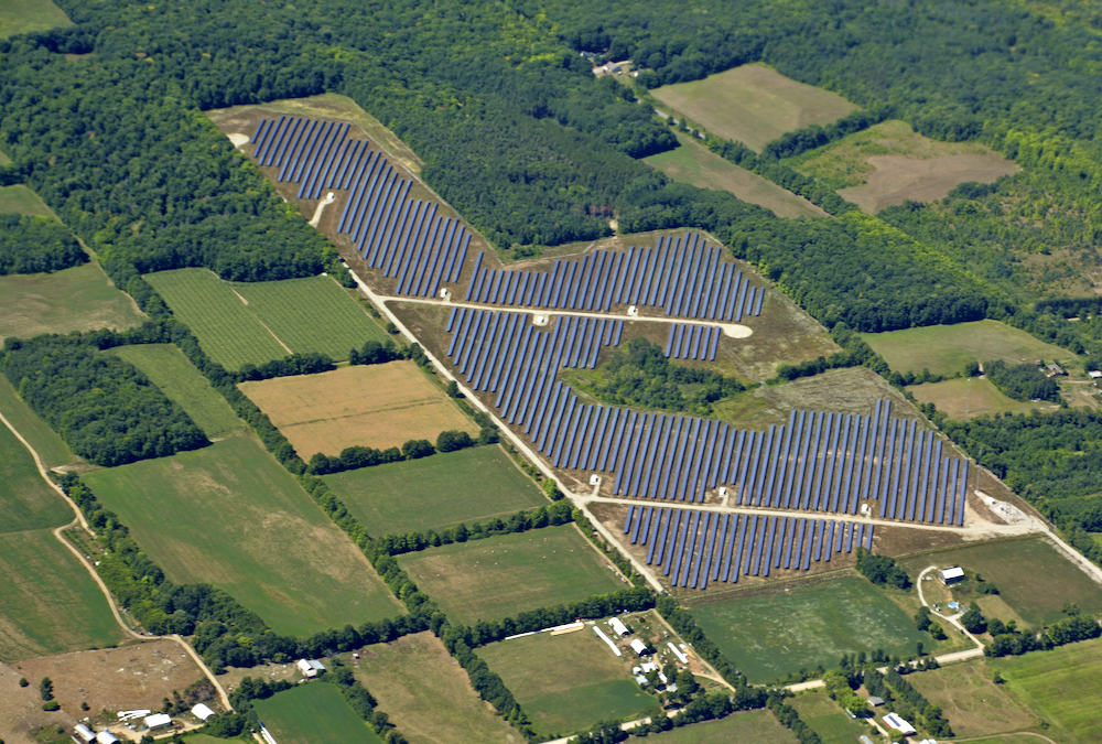 An aerial view of modern farming, solar power generating field in Southern Ontario.