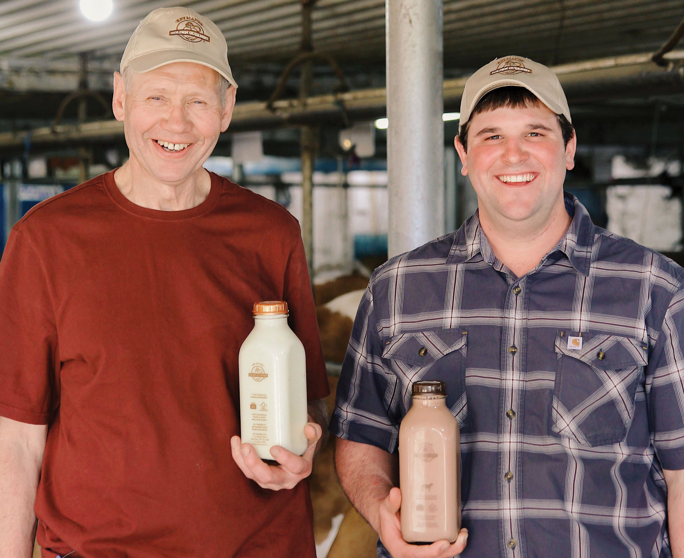 Jim Eby (left), with Guernsey producer
Marlin Marin of Mar-Ley Farms.