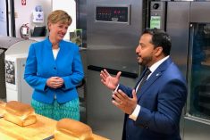 Agriculture Minister Marie-Claude Bibeau on July 19 attended an event in Winnipeg marking the 50th anniversary of Cereals Canada with that organization’s CEO Dean Dias. (Dave Bedard photo)