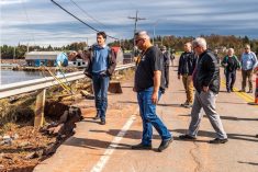 Prime Minister Justin Trudeau views damage to lobster boats from Hurricane Fiona at Stanley Bridge, P.E.I. on Sept. 27, 2022. (Photo: Reuters/Phil Matusiewicz)