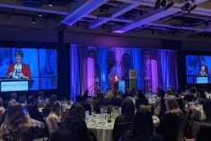 Federal Agriculture Minister Marie-Claude Bibeau speaks at the evening reception at the Advancing Women in Agriculture conference in Calgary on March 13, 2023. (Jessika Guse photo)
